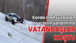 Karda mahsur kalan araçların yardımına vatandaşlar koştu