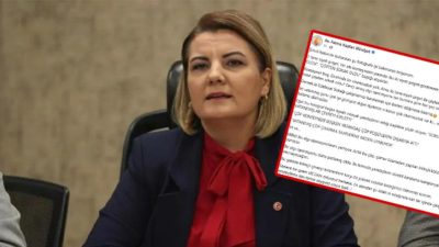 Fatma Başkan, yer altı konteyneri yanındaki iki siyah poşetin “çöp